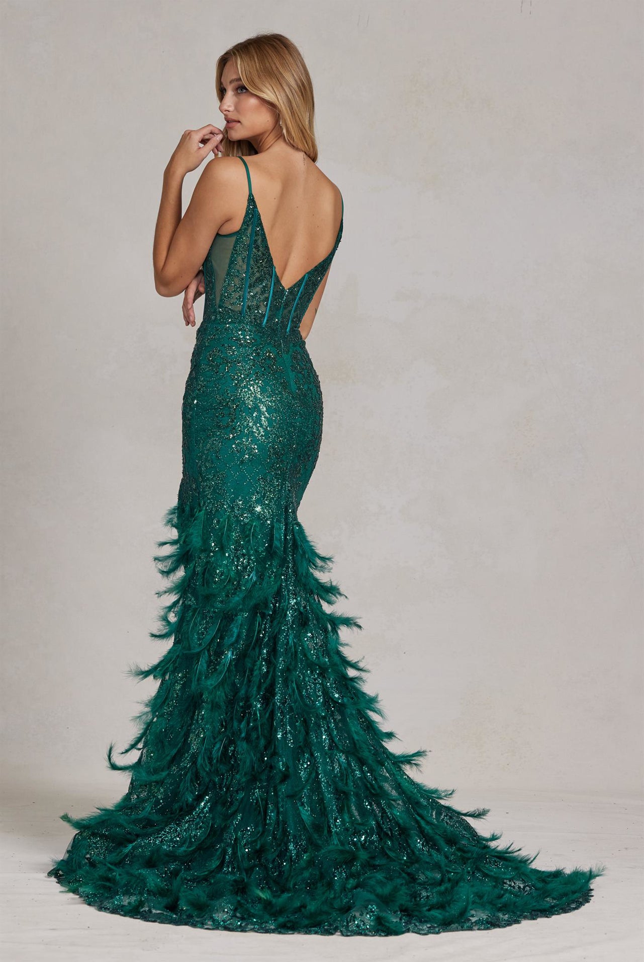 Back of an emerald feather skirt dress