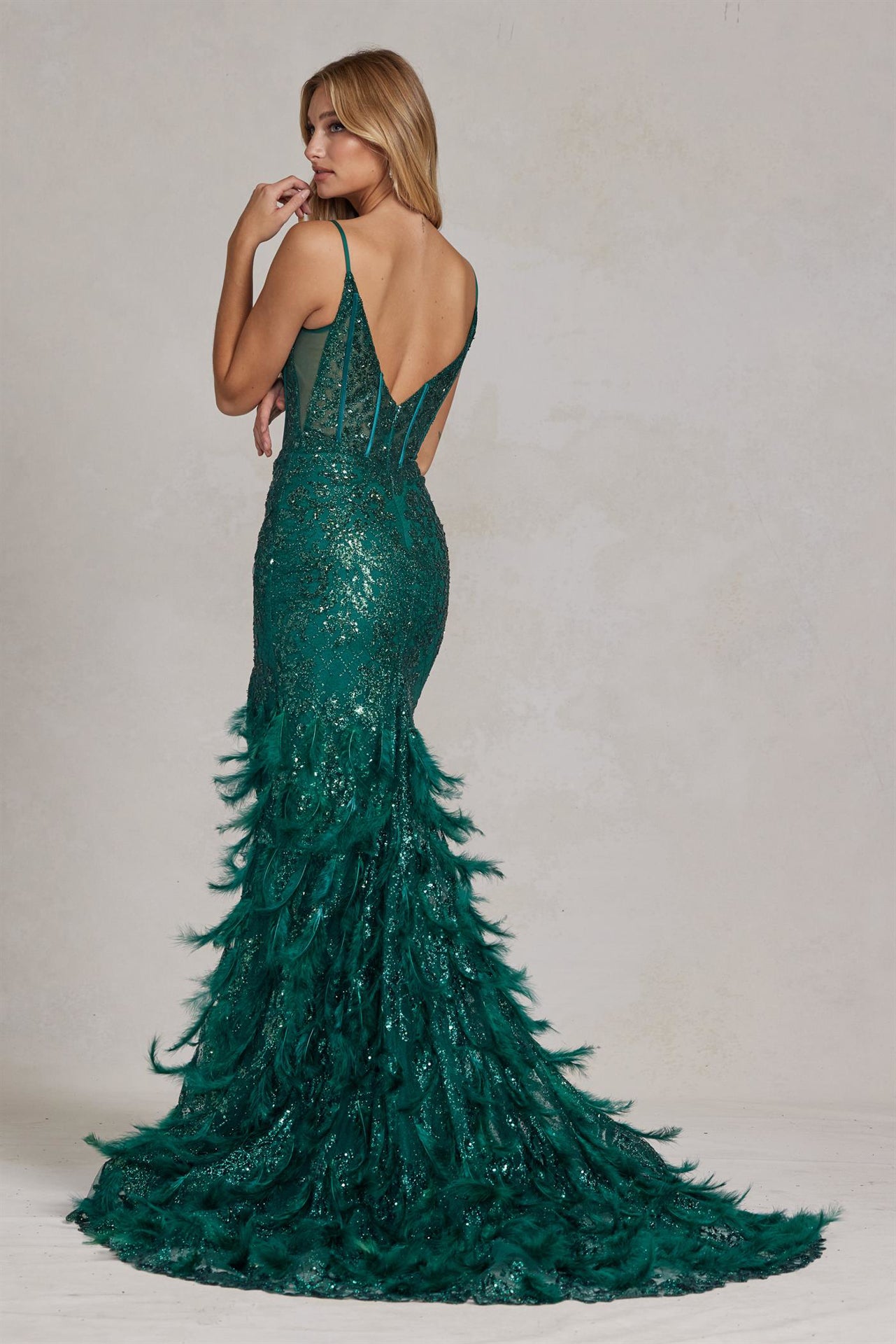Back of an emerald feather skirt dress