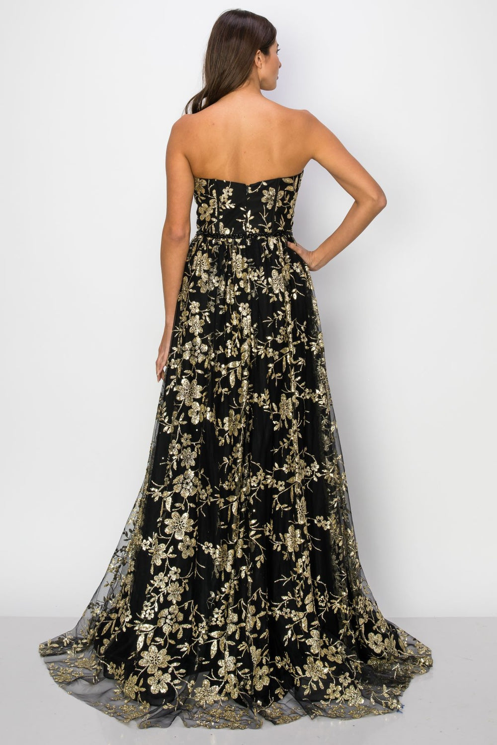 Back of the black glitter off shoulder dress