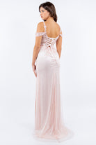 Back of blush long dress with side slit