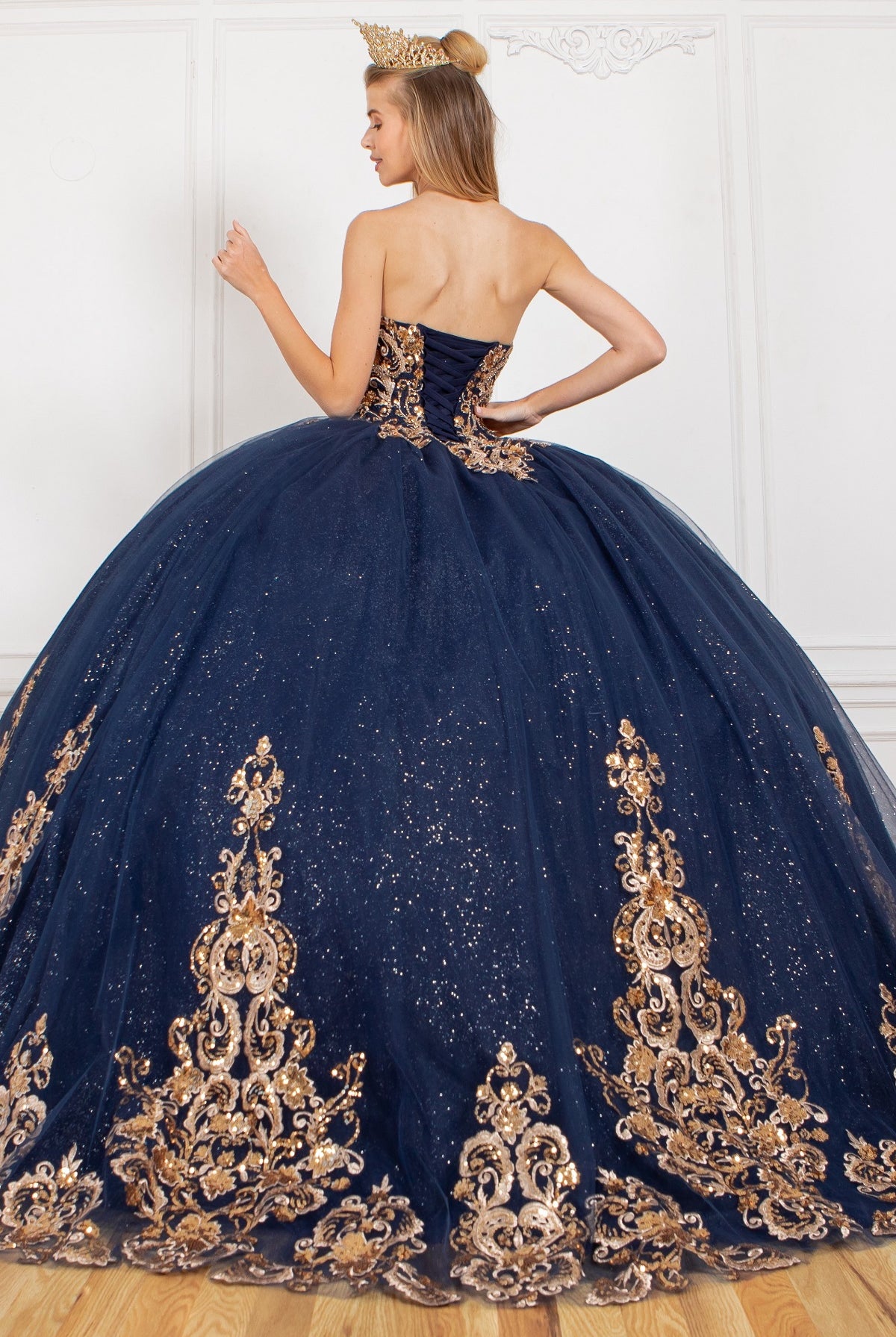 Back of formal gown with gold applique