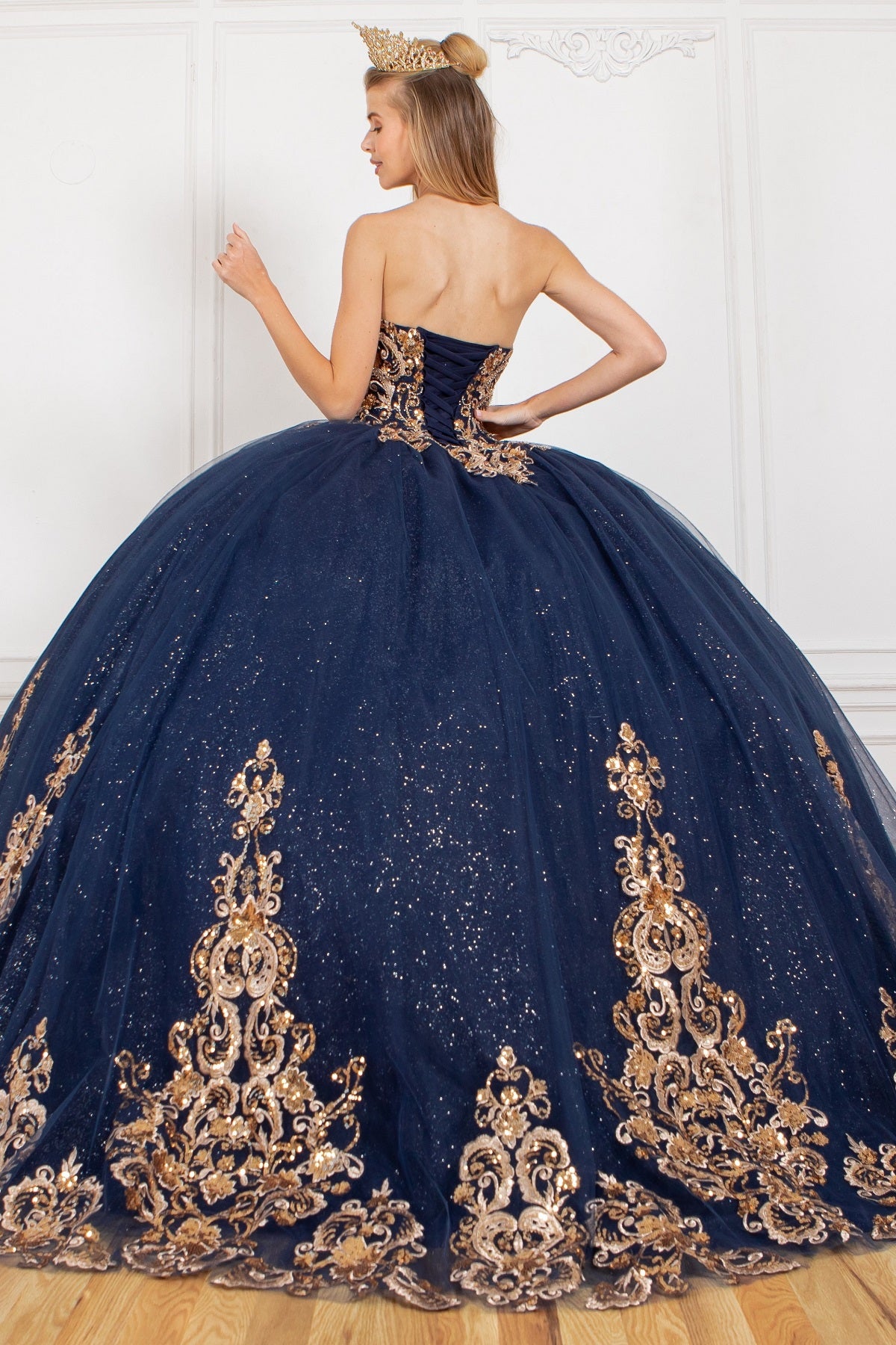 Back of formal gown with gold applique