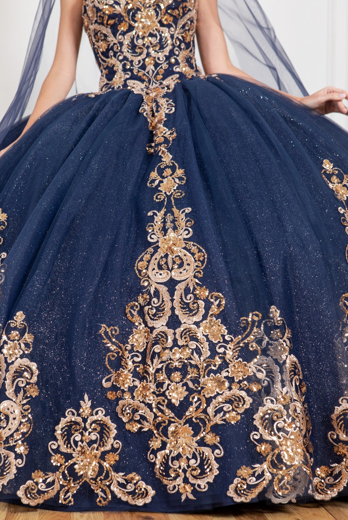 A closer look at formal gown with gold applique