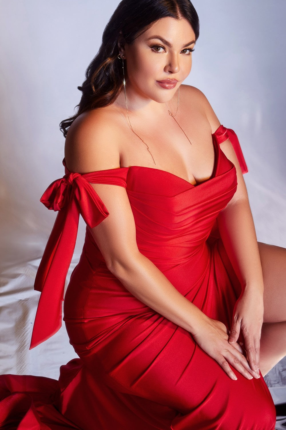 Curve-fitted jersey gown with off-shoulder bodice, relaxed trumpet skirt, and leg slit-smcdress