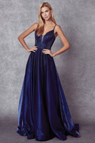 Navy blue prom gown with stone accents