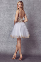 Back of white embroidered bodice short dress