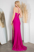 back of fuschia corset style prom dress