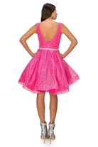 Back of hot pink open back cocktail dress