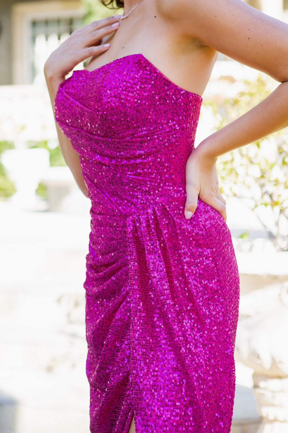 A closer look at fuschia sequin side slit evening dress