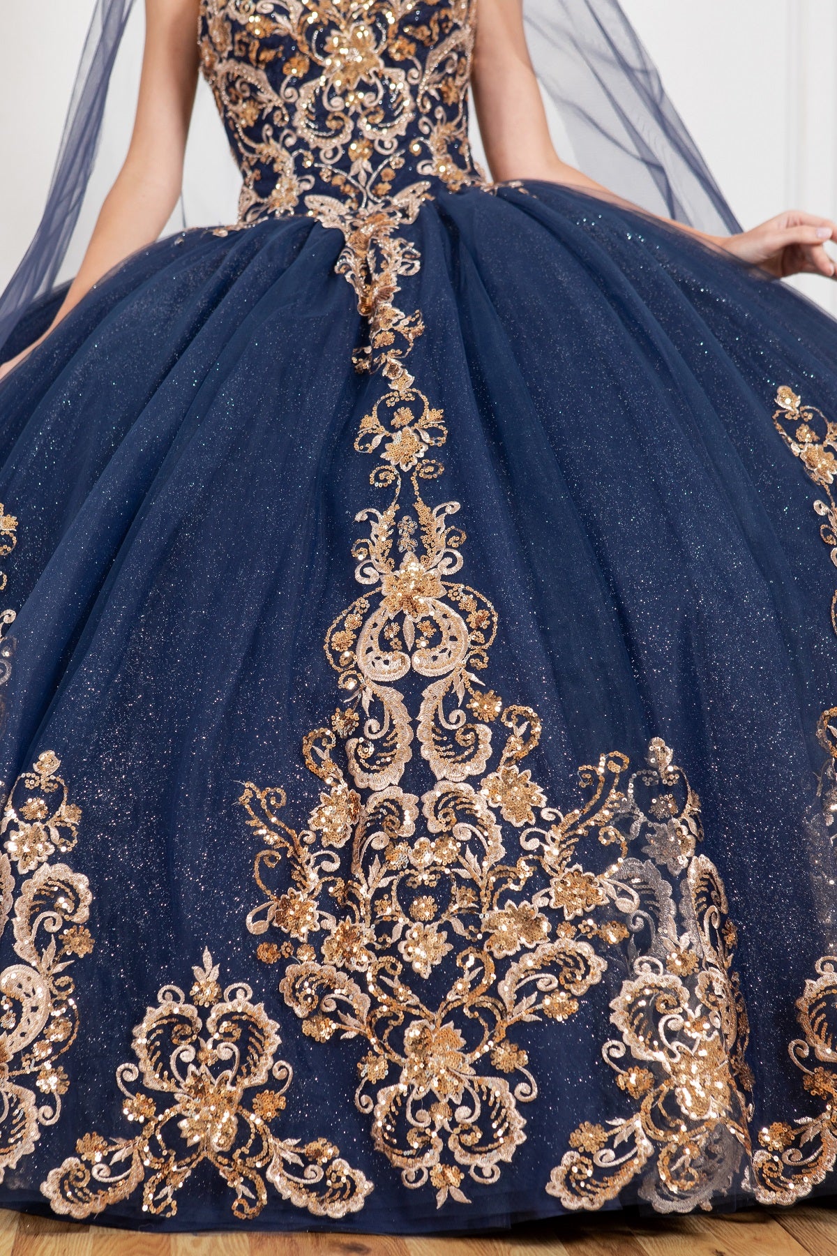 A closer look at formal gown with gold applique