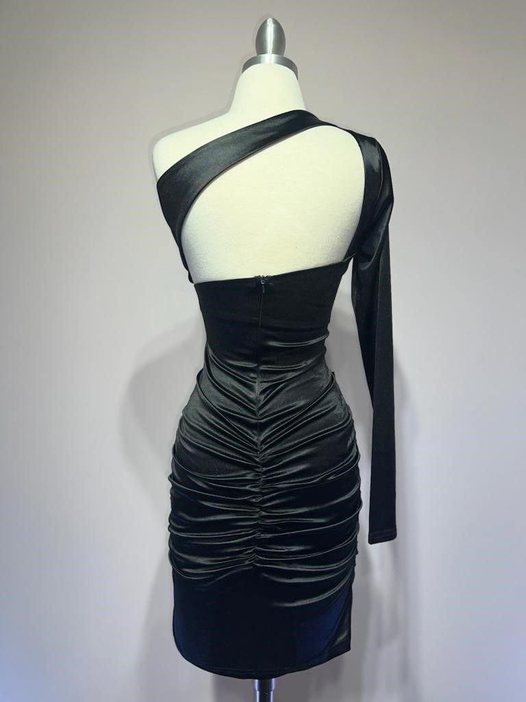 back of black one shoulder satin mini dress
