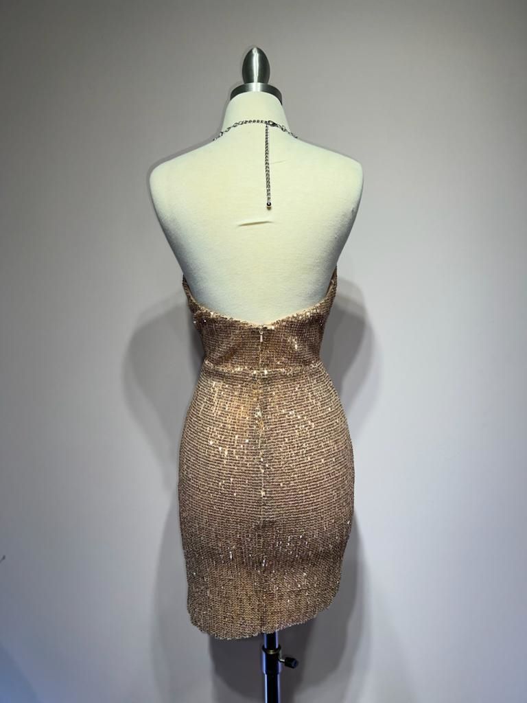 Back of open back sequin short dress