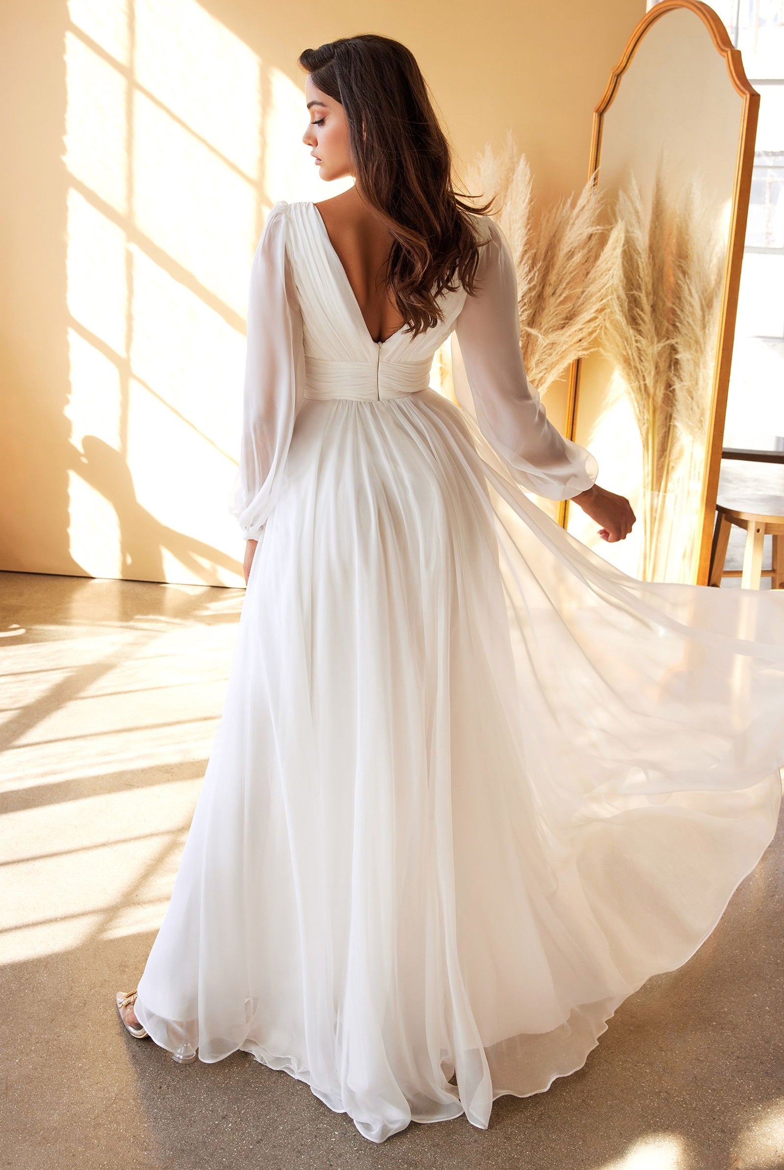 Back of chiffon long sleeve bridal dress